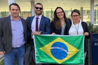 Foto de quatro estudantes brasileiros participando  na  Yale’s Integrated Leadership Case Competition, promovida pela GNAM