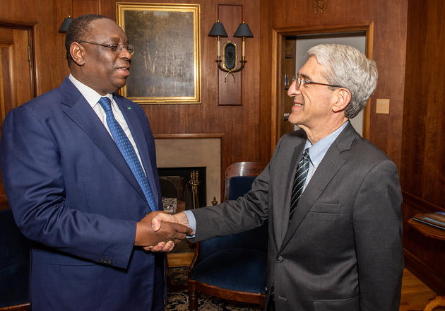 His Excellency Macky Sall, president of the Republic of Senegal, greets President Peter Salovey in his office.